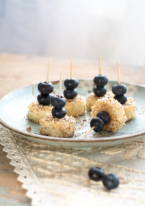 Skewered bananas with almonds and blueberries
